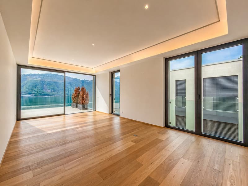 Ampio attico con magnifica terrazza vista lago a Bissone (4)