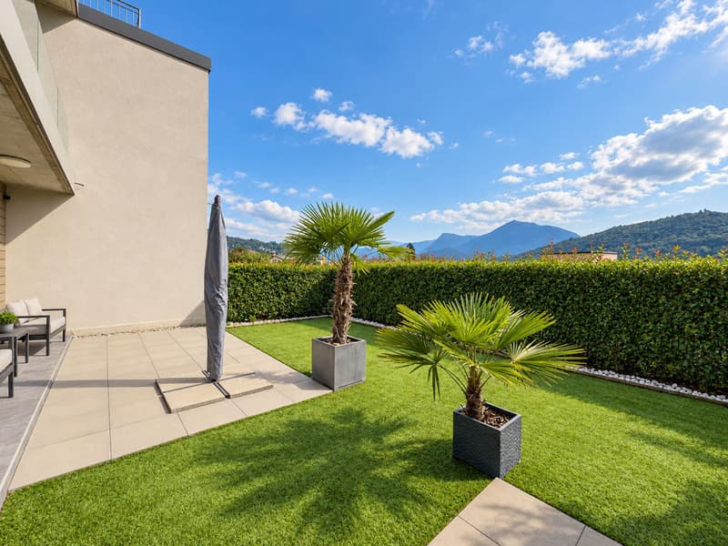 Casa a schiera con giardino ad Agno (10)