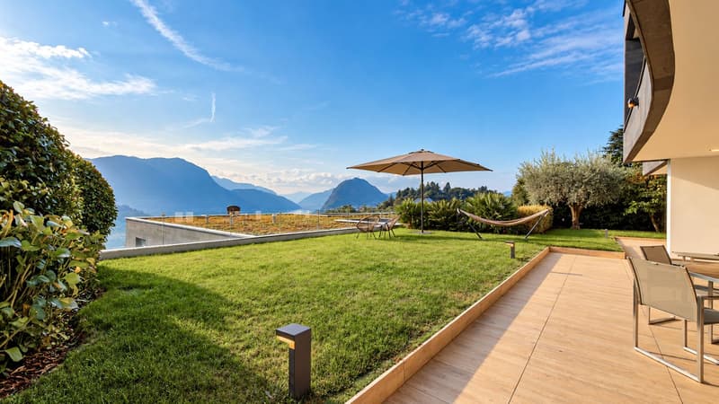 Elegante e prestigioso appartamento con giardino a Porza (14)