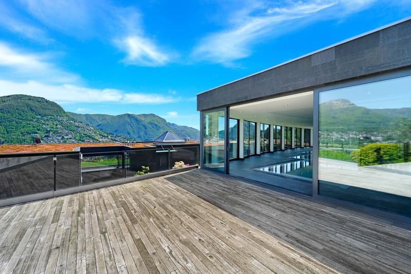 Elegante e prestigioso appartamento con giardino a Porza (23)