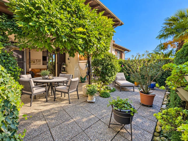 Casa contigua con terrazza e giardino a Gravesano (1)