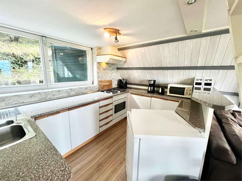Maison de vacances soignée avec grande terrasse, jardin et vue sur le lac (6)