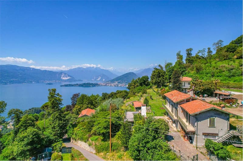 Villa da ristrutturare con bellissima vista lago e ampio giardino priv (3)