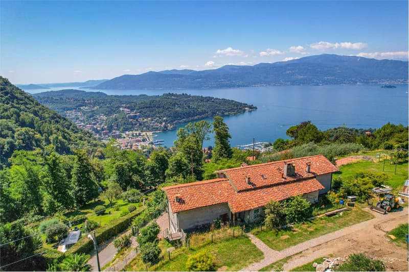 Villa da ristrutturare con bellissima vista lago e ampio giardino priv (7)