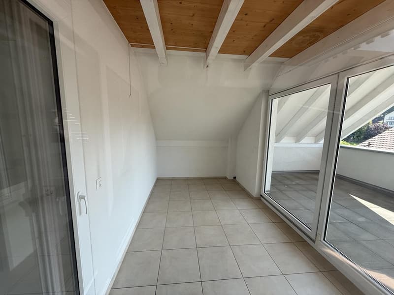 4.5-room attic apartment with winter garden, attic storage & spacious outdoor areas (3)
