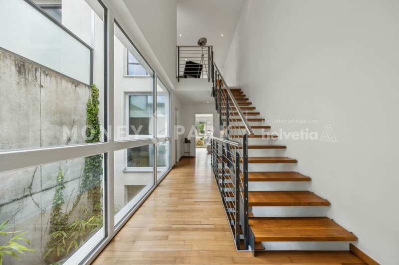 Casa a schiera moderna con atrio, terrazza e giardino (4)