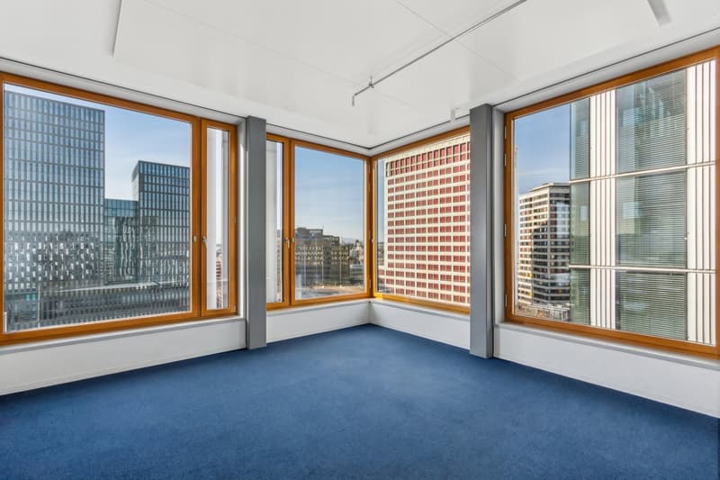 large windows, blue carpet, modern and clean, empty, city view