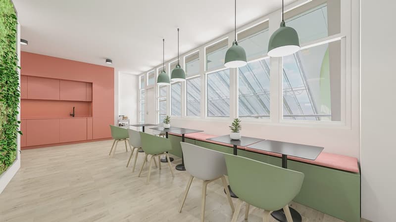 Modern kitchen with coral-colored cabinets, large windows, green chairs, and pendant lights