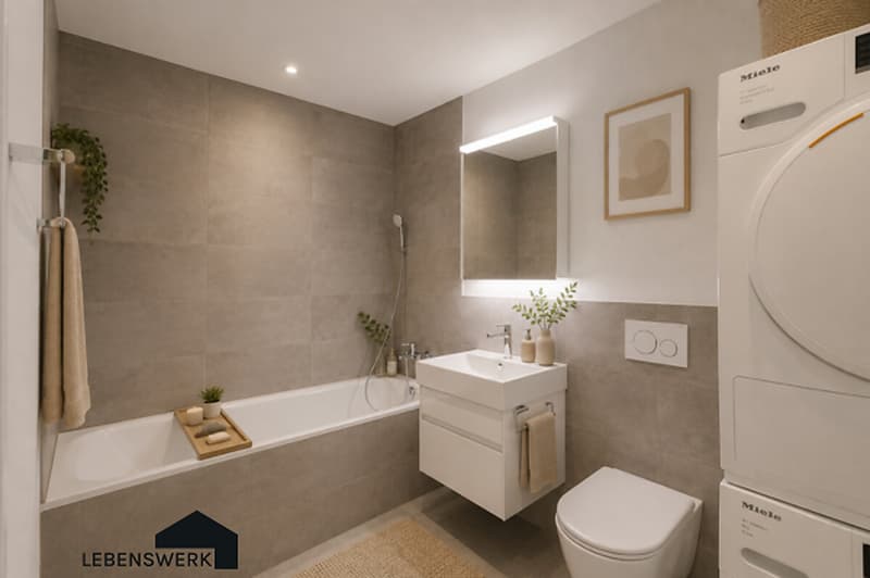 Modernes Badezimmer mit Badewanne und praktischer Waschturm-Lösung komfortabel und funktional gestaltet.