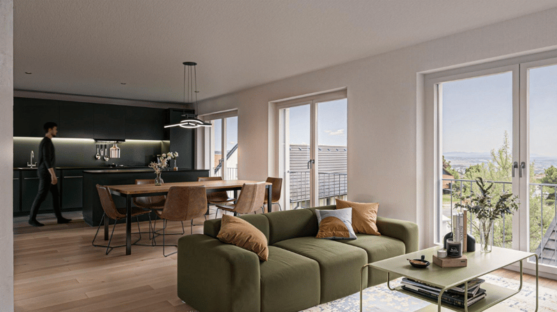 a modern open-plan living and dining area with a kitchen, a green sofa with pillows, a glass table, a wooden table with chairs, a coffee table, a ceiling lamp, a view from the balcony