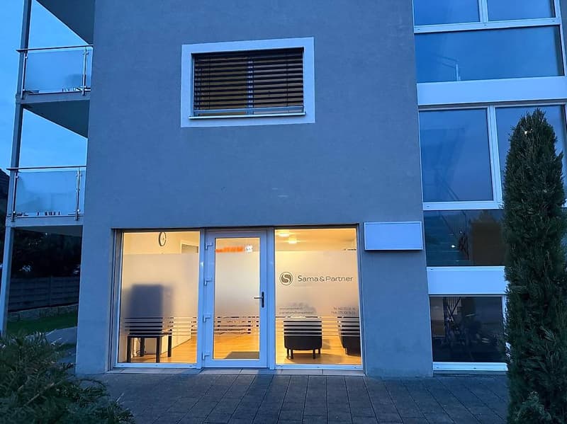 modern building, glass doors, glass windows, balcony, logo on entrance