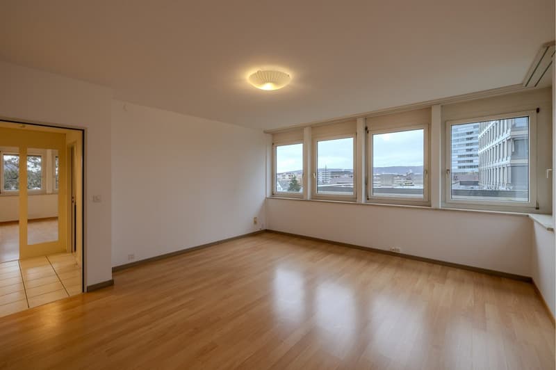 large windows, parquet floor, modern ceiling lamp
