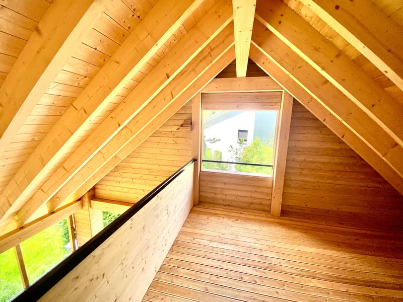 wooden beams ceiling, wooden walls, floor, small window