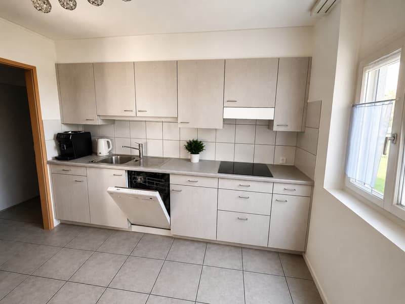 Appartamento attraente di 4,5 locali con balcone, garage e molto spazio di stoccaggio (9)