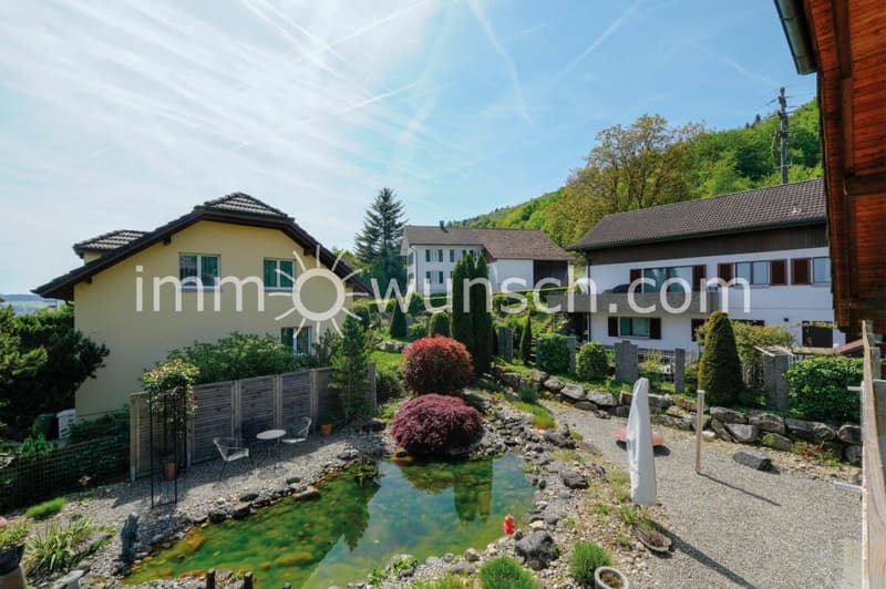 Casa familiare affascinante di 5 ½ locali con splendido giardino, in zona residenziale elevata e tranquilla (2)