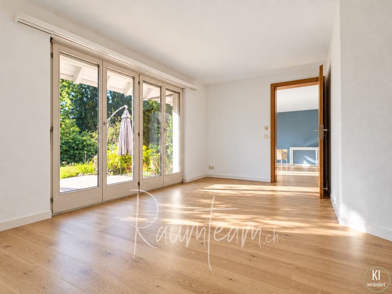 Gartenzimmer / Wohnzimmer mit visualsiertem Parkettboden