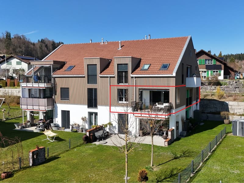 2 story house, brown roof, white walls, balcony, garden, fenced yard