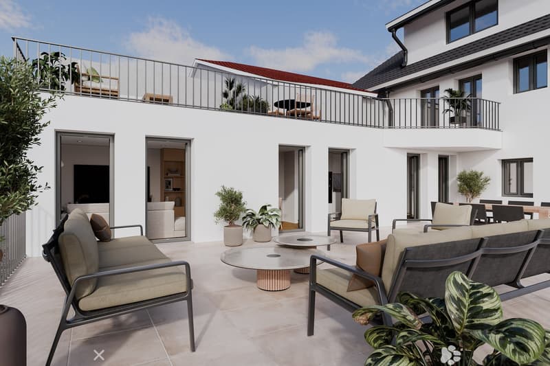 Outdoor lounge area with multiple seating arrangements, tables, plants, and a balcony.