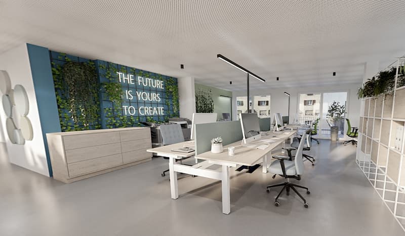 modern office with desks, chairs, plants, and a motivational wall