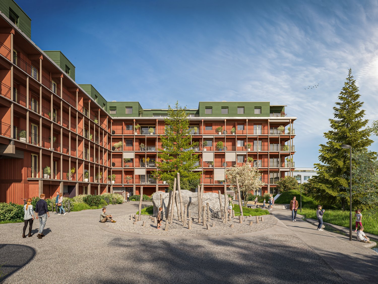 multi-story building, red facade, green roofs, balconies, green outdoor area with playground, trees, grass