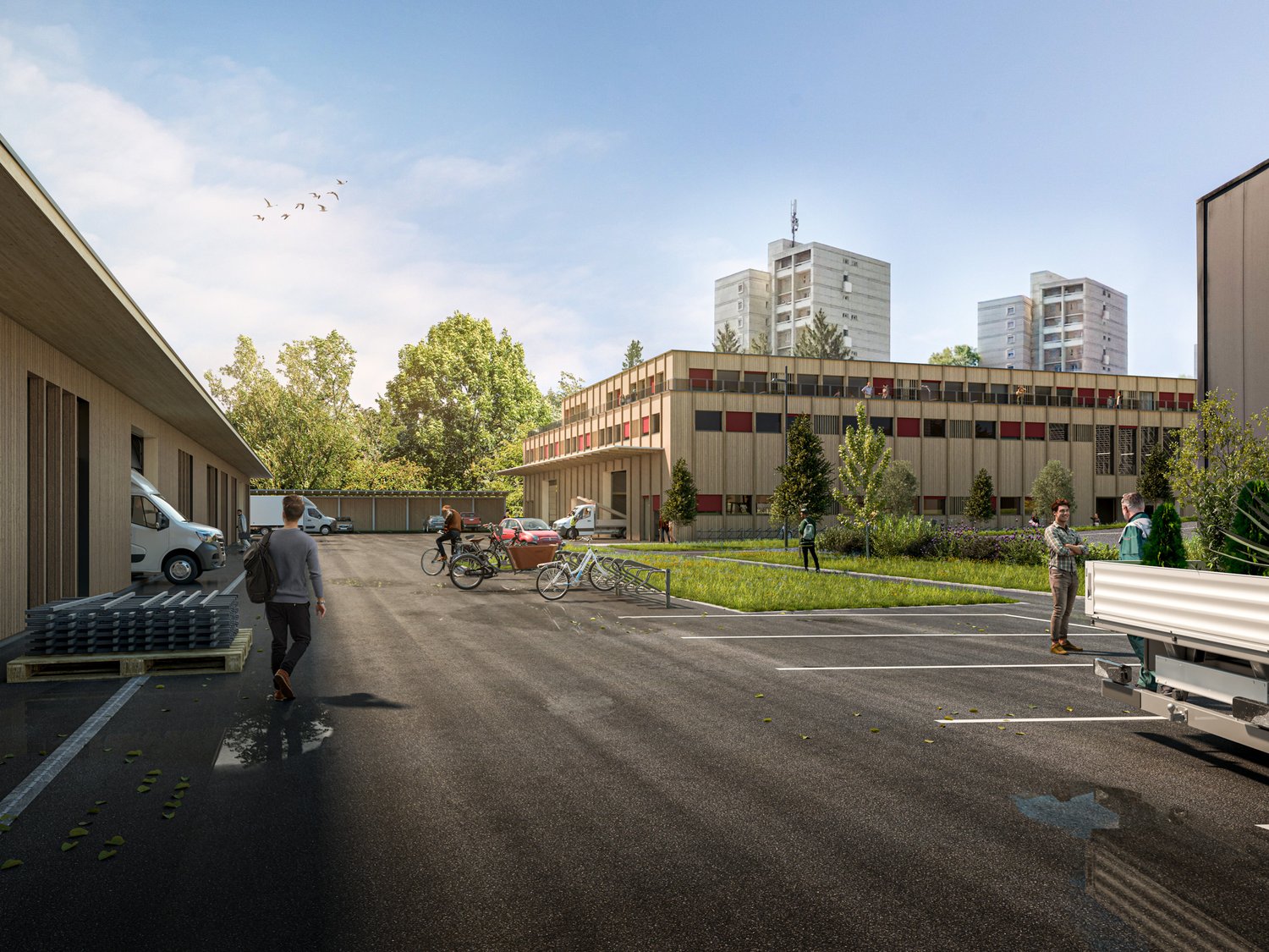 Modern office building with parking, bicycles, greenery, and people in front.