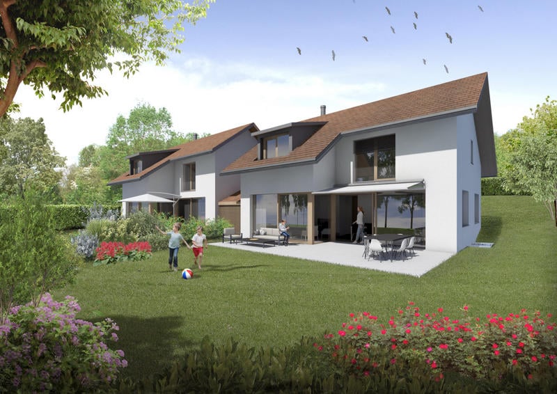 Two story house, white exterior, brown roof, balcony, patio with outdoor seating, garden, multiple windows, a view