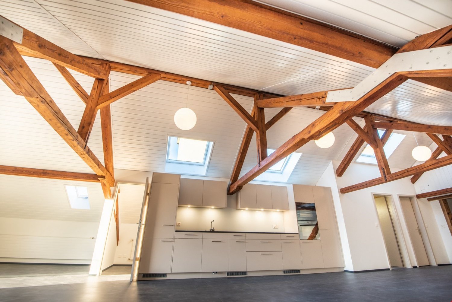 modern kitchen, wooden beams, skylights, neutral color scheme, minimalist design