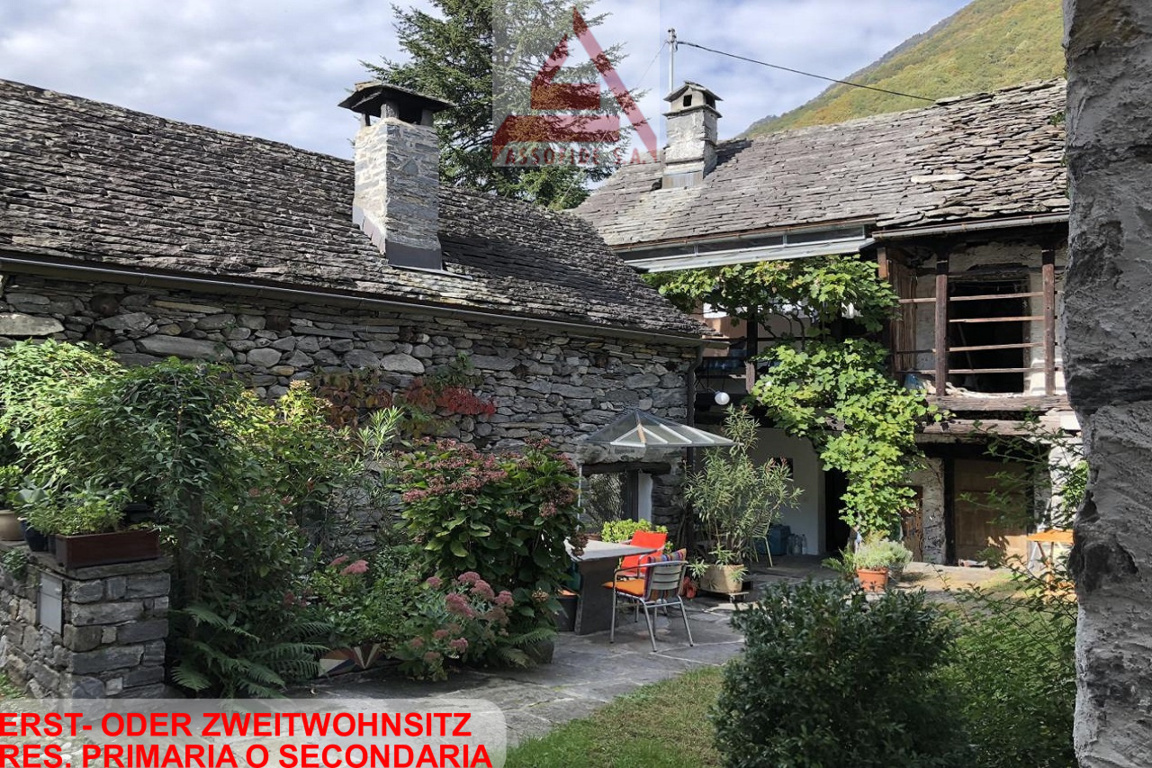 stone walls, patio, plants, swimming pool