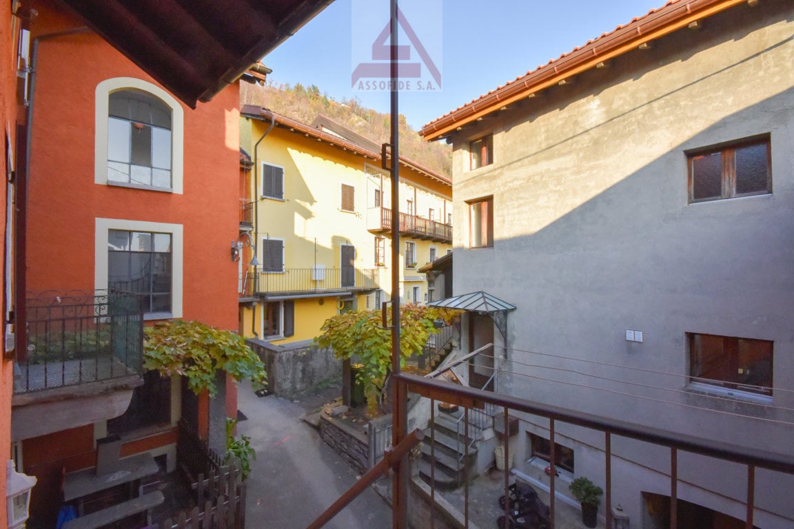 Balcony, windows, steps, fence, plant, walkway