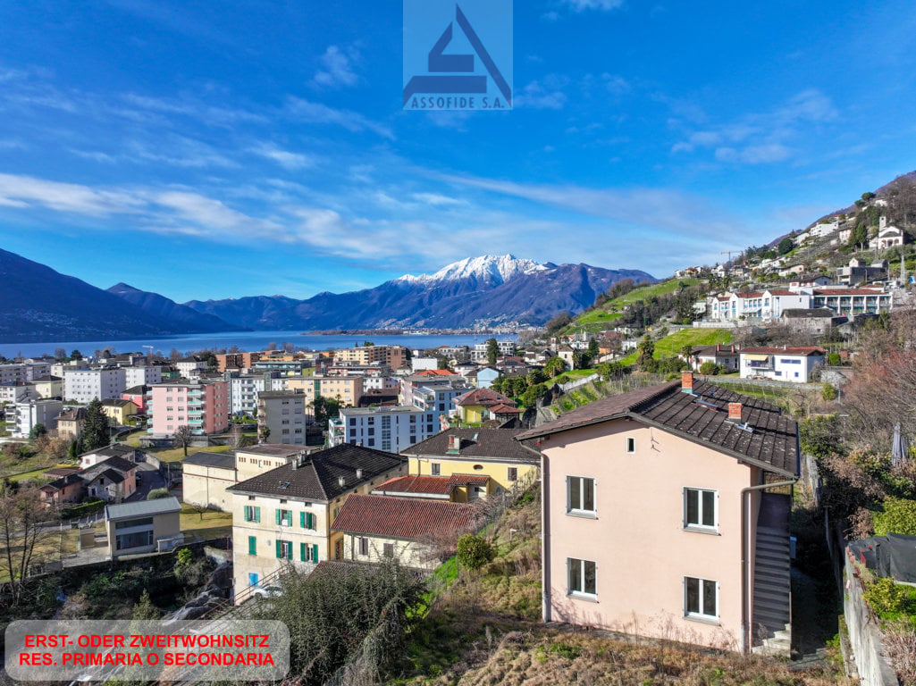 House in hillside village with lake and mountain view, single family home with large terrace