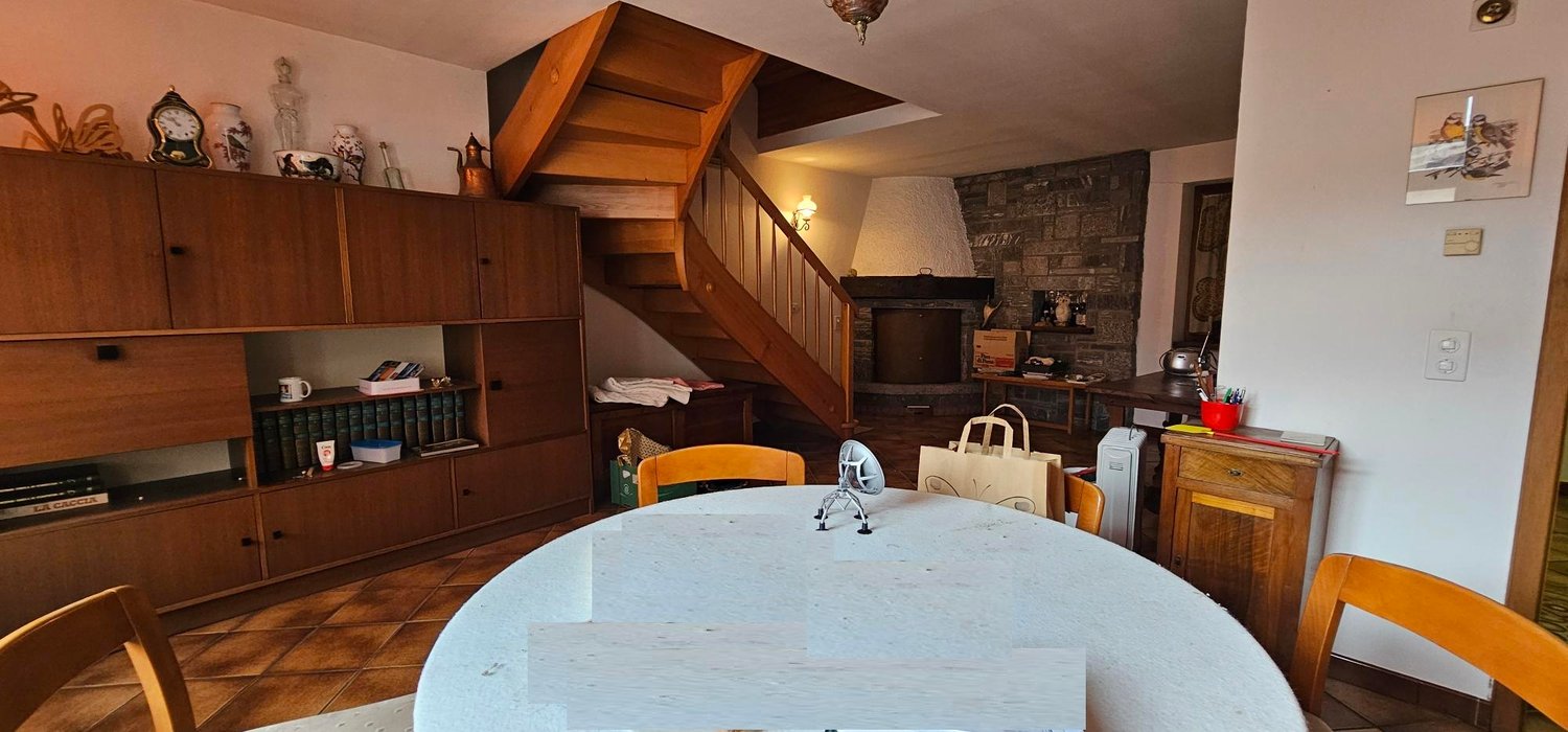 table, chairs, fireplace, cabinets, shelves, staircase