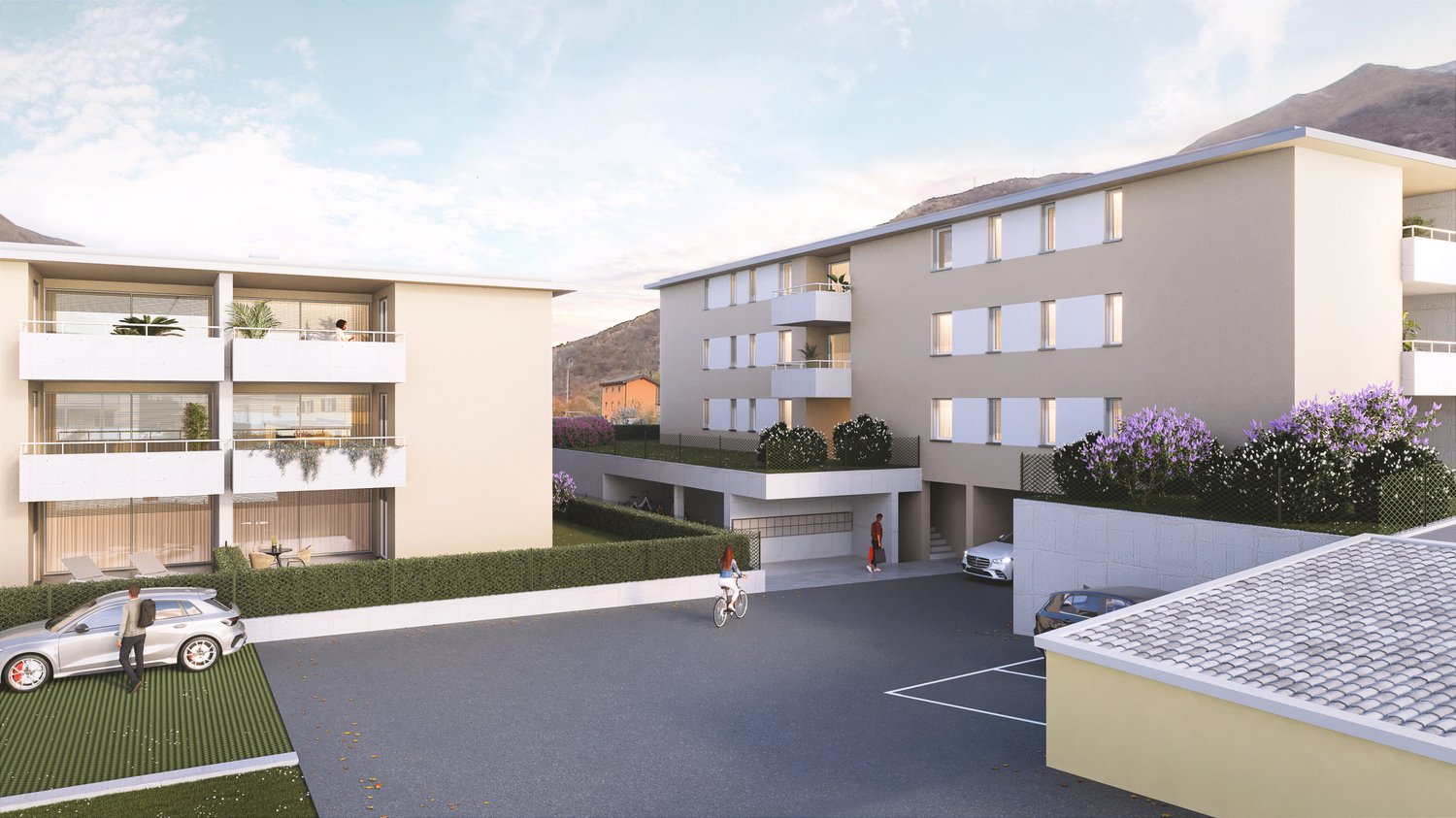 Apartment complex with 2 buildings, each with multiple floors, balcony, garage, and parking in front