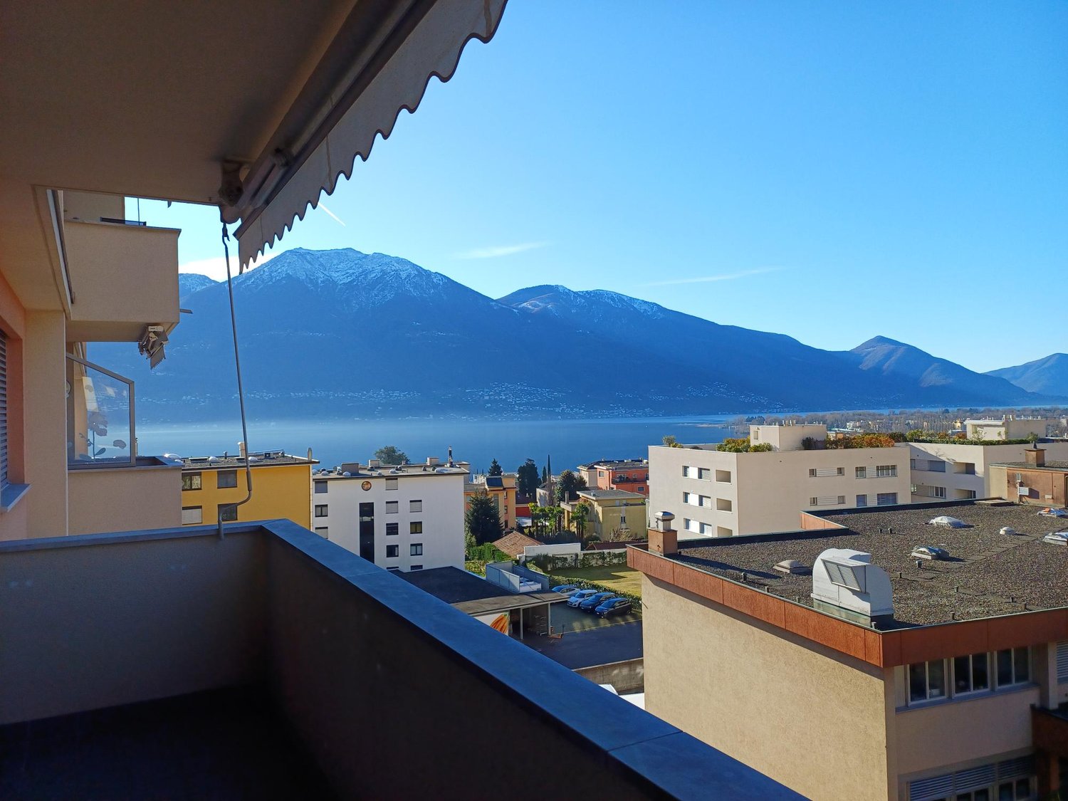 Aerial view from a balcony with a sea and mountain view