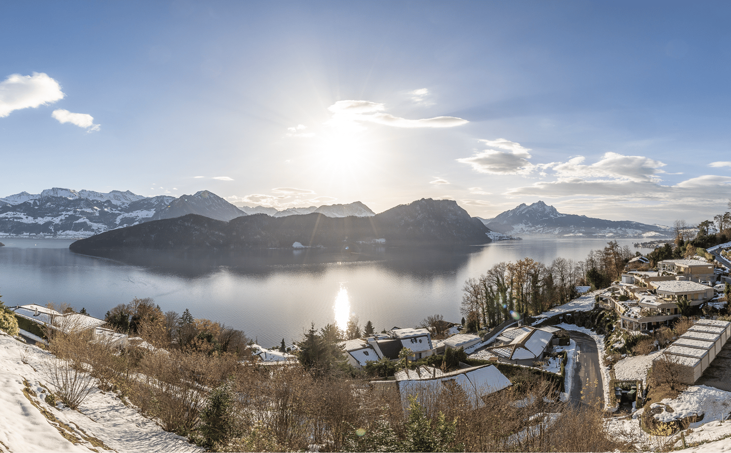 a scenic view of the mountains and lake