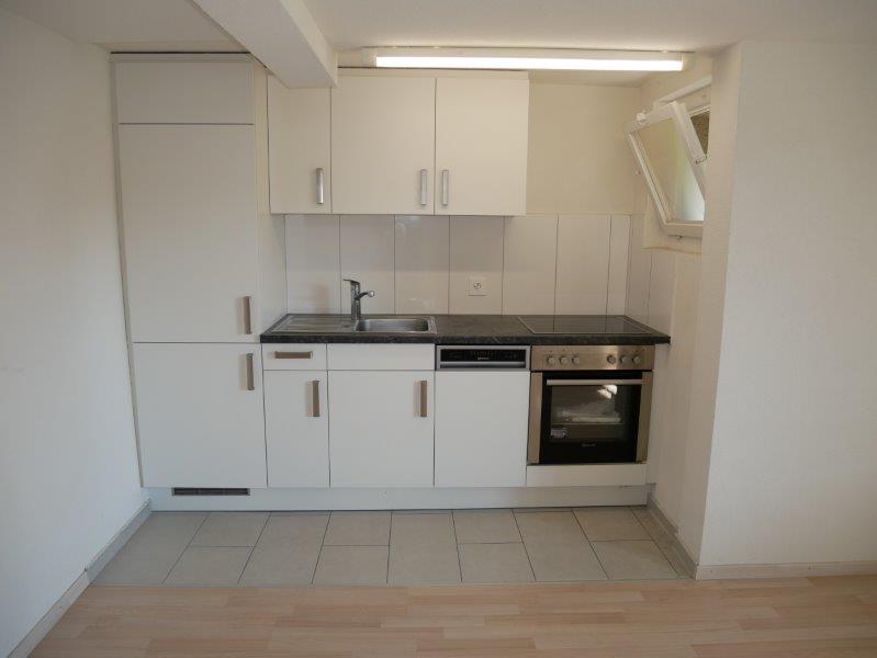 modern kitchen, white cabinets, tiled floor, stainless steel sink, electric oven, dishwasher