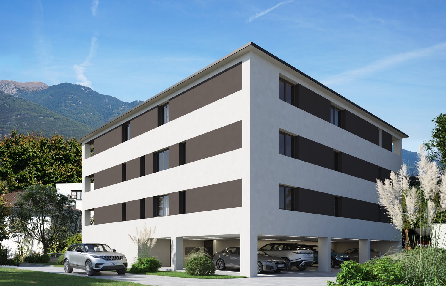 A modern, multi-story apartment building with a clean, minimalist design. The building has a white and gray exterior with large windows. There is a garage and parking spaces visible in the front of the building.