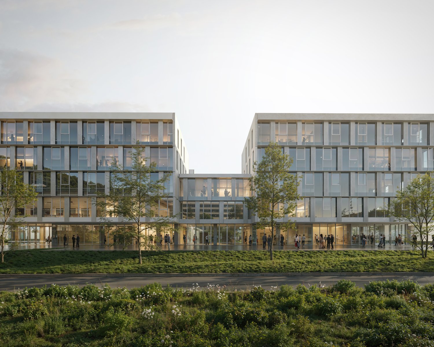 Modern office building with glass facade, multiple floors, entrance with glass doors, people walking around, trees, and green lawn