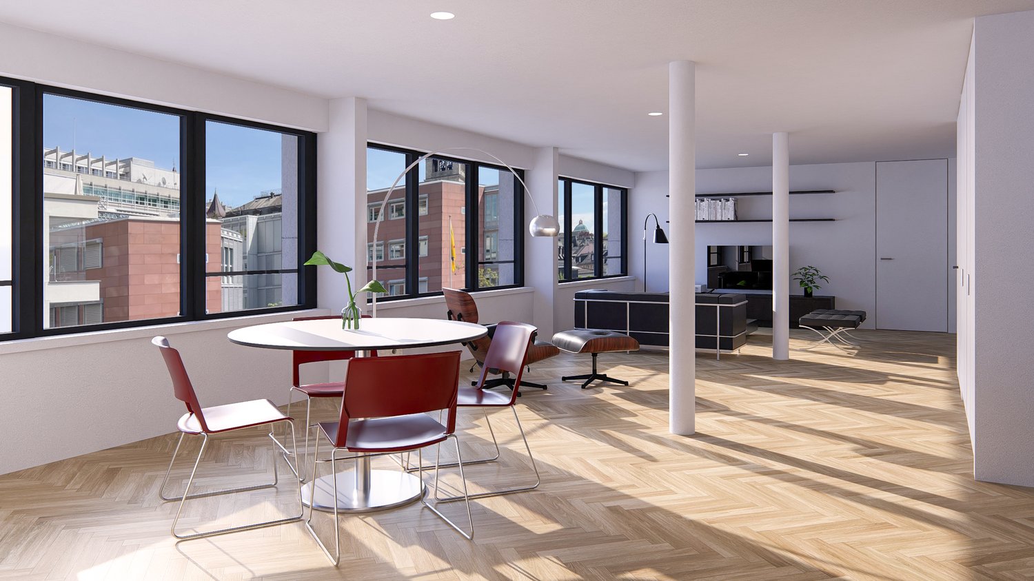 Spacious open-plan living area with large windows, hardwood flooring, modern furniture including a round dining table with red chairs, and built-in shelving units