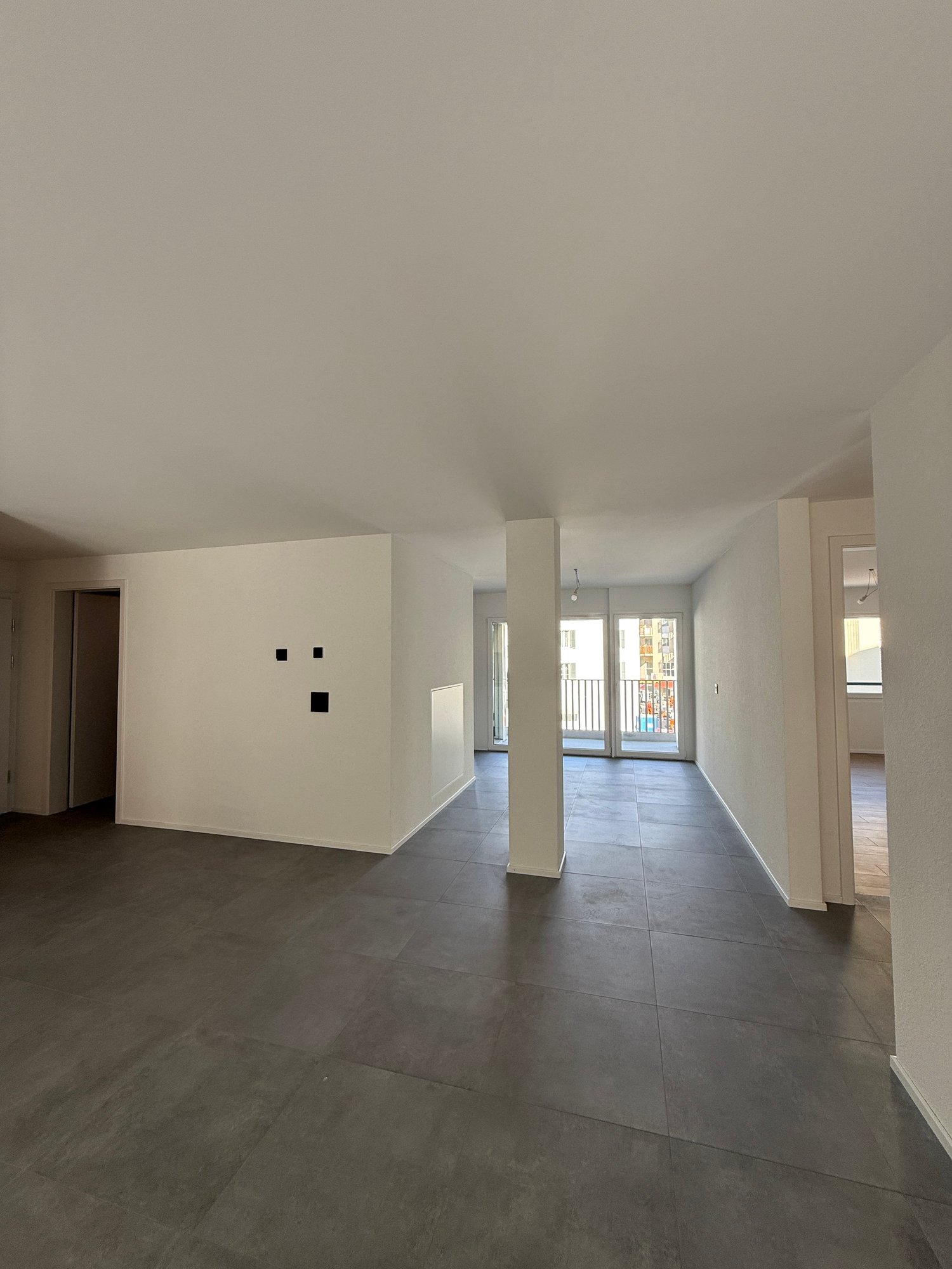 tiled floor, white walls, balcony with a view of the outside