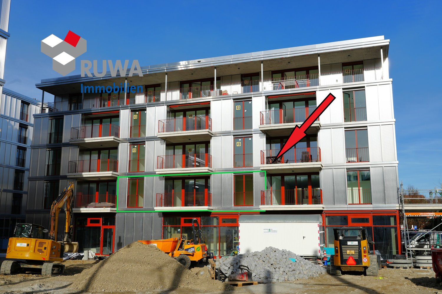 multi-story building, glass windows, balconies, metallic facade