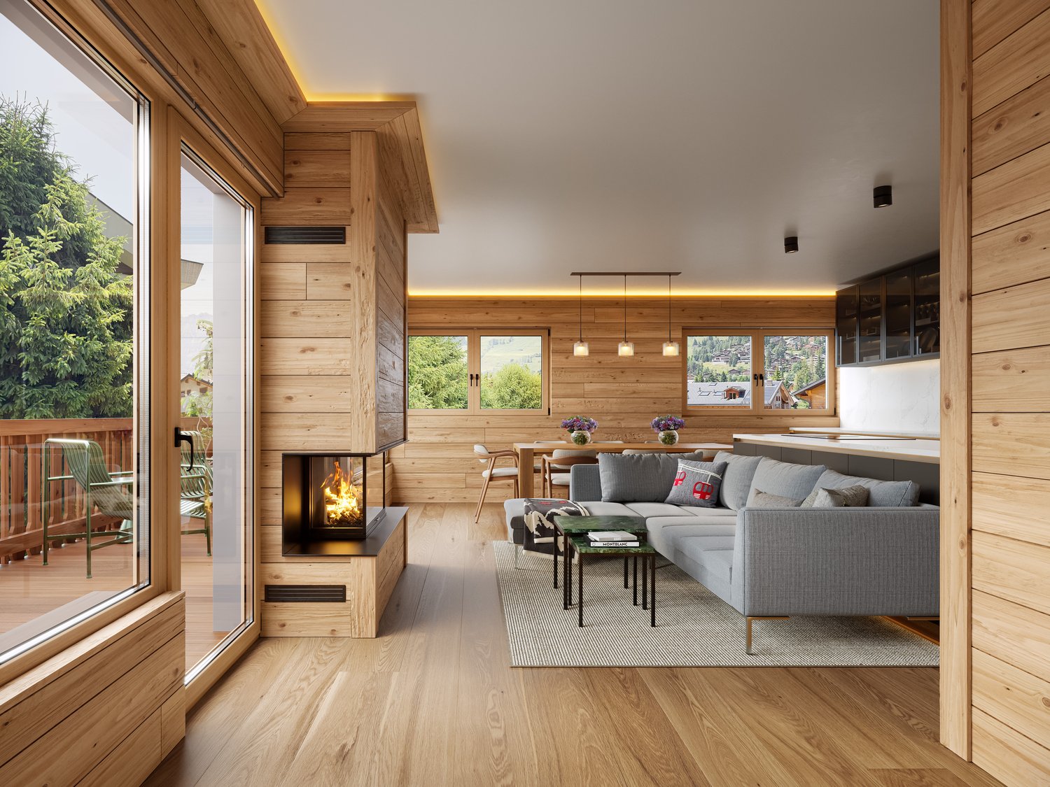 wooden walls and flooring, white ceiling, fireplace, large glass windows, L-shaped gray couch, coffee tables, rug, deck with outdoor chairs, view of trees and mountains
