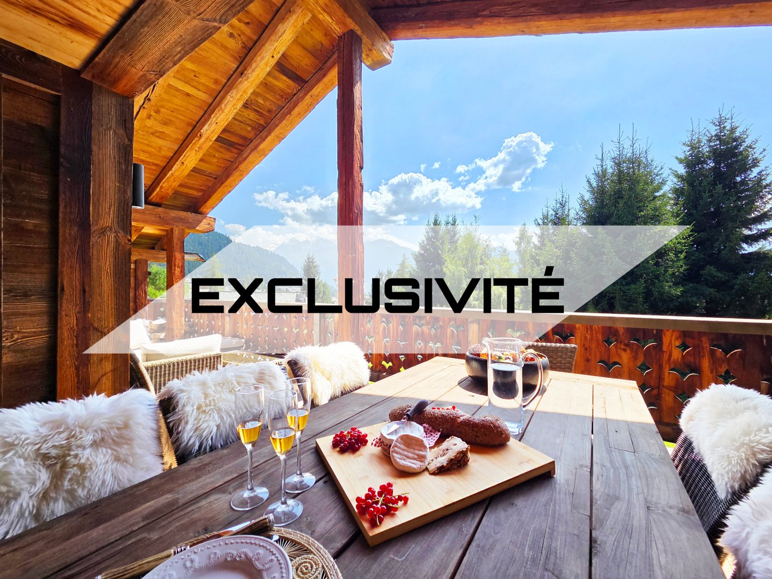 balcony, table, food, glasses, mountains in the background