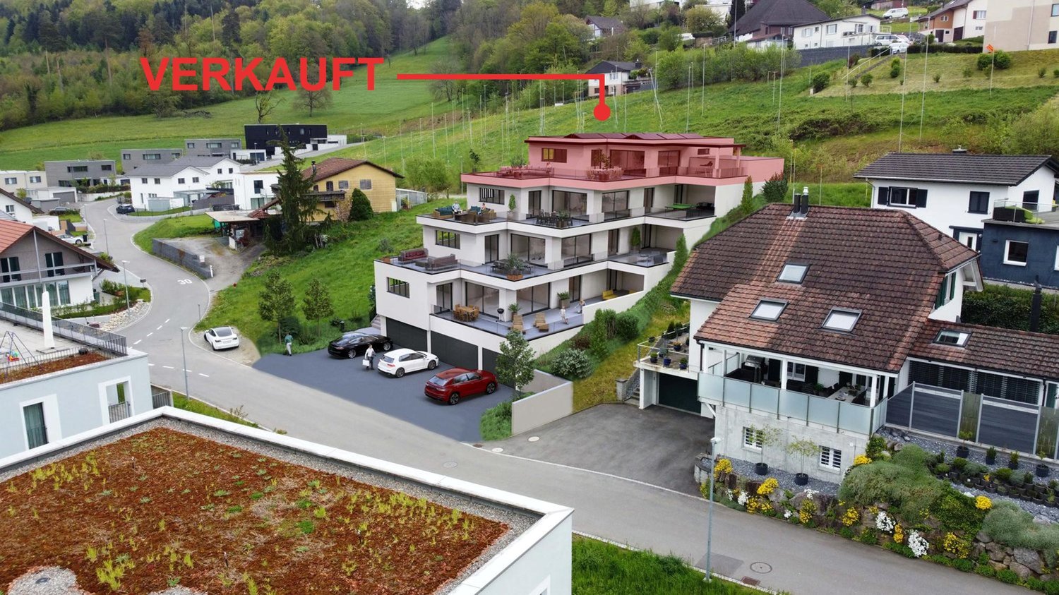 Apartment building with raised ground floor, garage and parking places