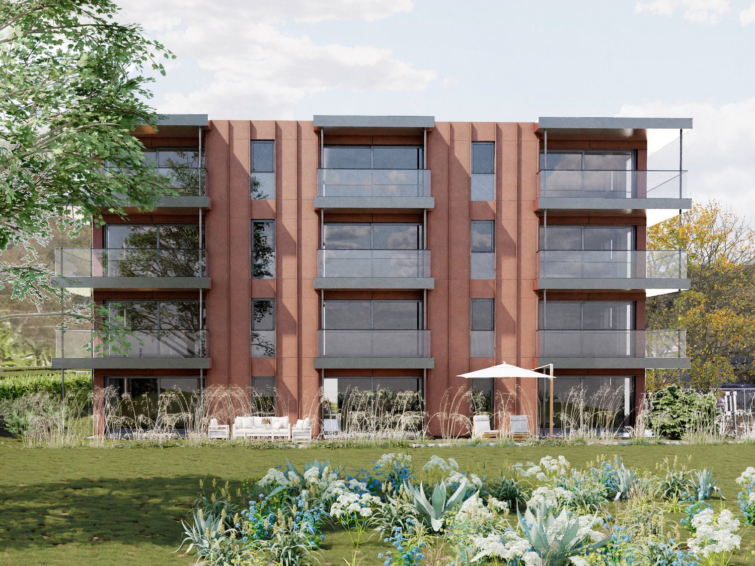 4-story modern apartment building with red brick facade, large windows, and balconies. The building is surrounded by a well-maintained garden with various flowering plants and shrubs.