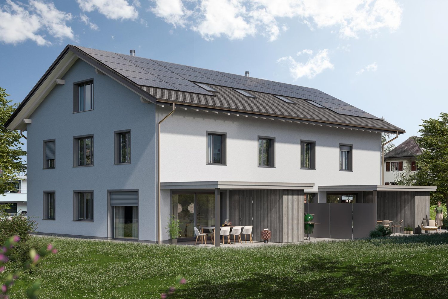 2-story house with solar panels on the roof, white exterior walls, large windows, patio with outdoor furniture, and a grassy yard with flowers.