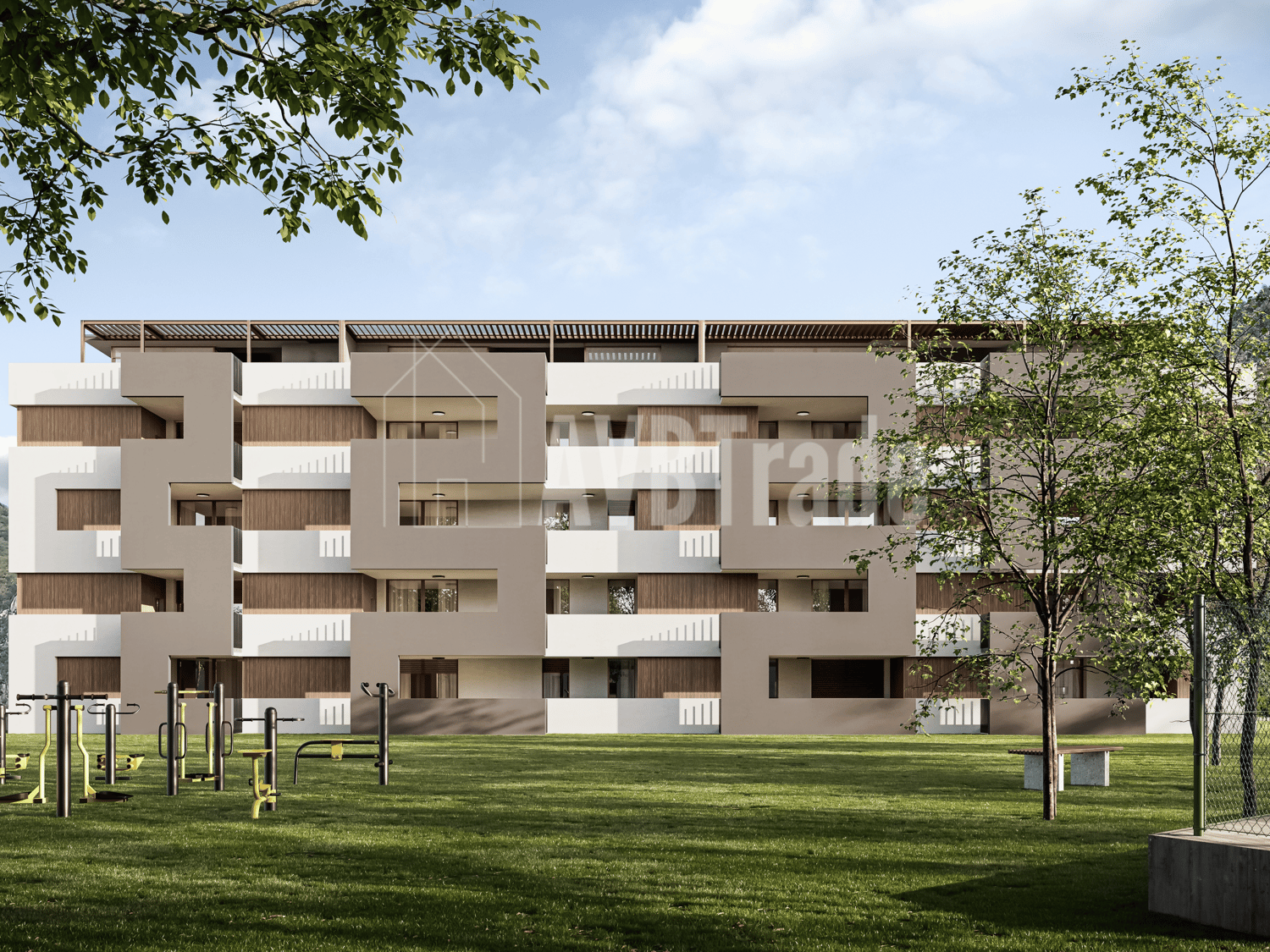 multi-story building with balconies, white and brown panels, children's playground, large grassy area