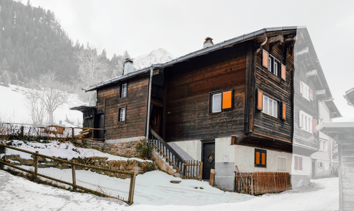 2 story wooden house, slanted roof, multiple windows, wooden fences