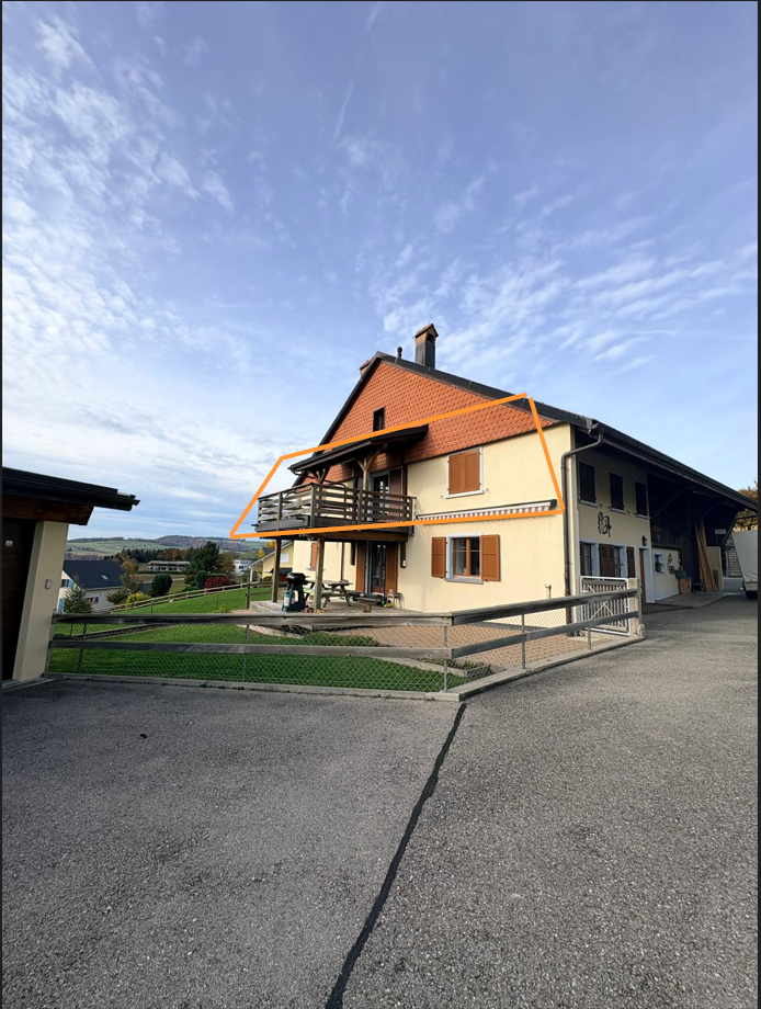 2 story house, red roof, white walls, balcony, fencing, driveway, BBQ, trees