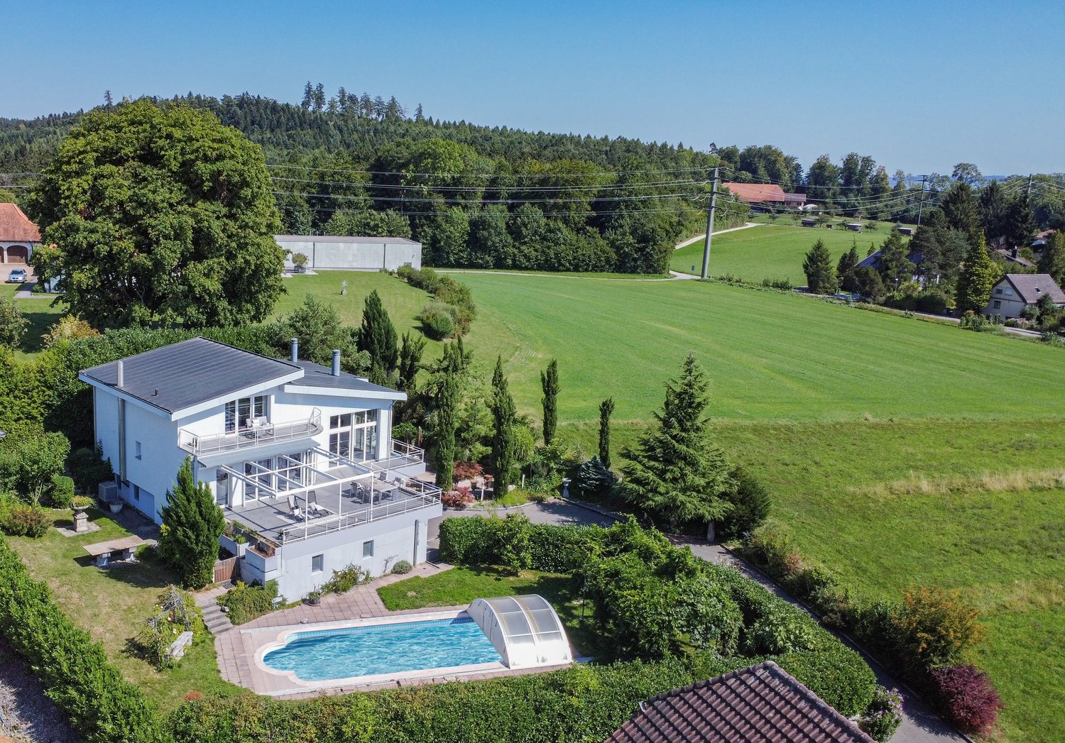 modern detached house, 2 story, large terrace, swimming pool, garden, green surroundings