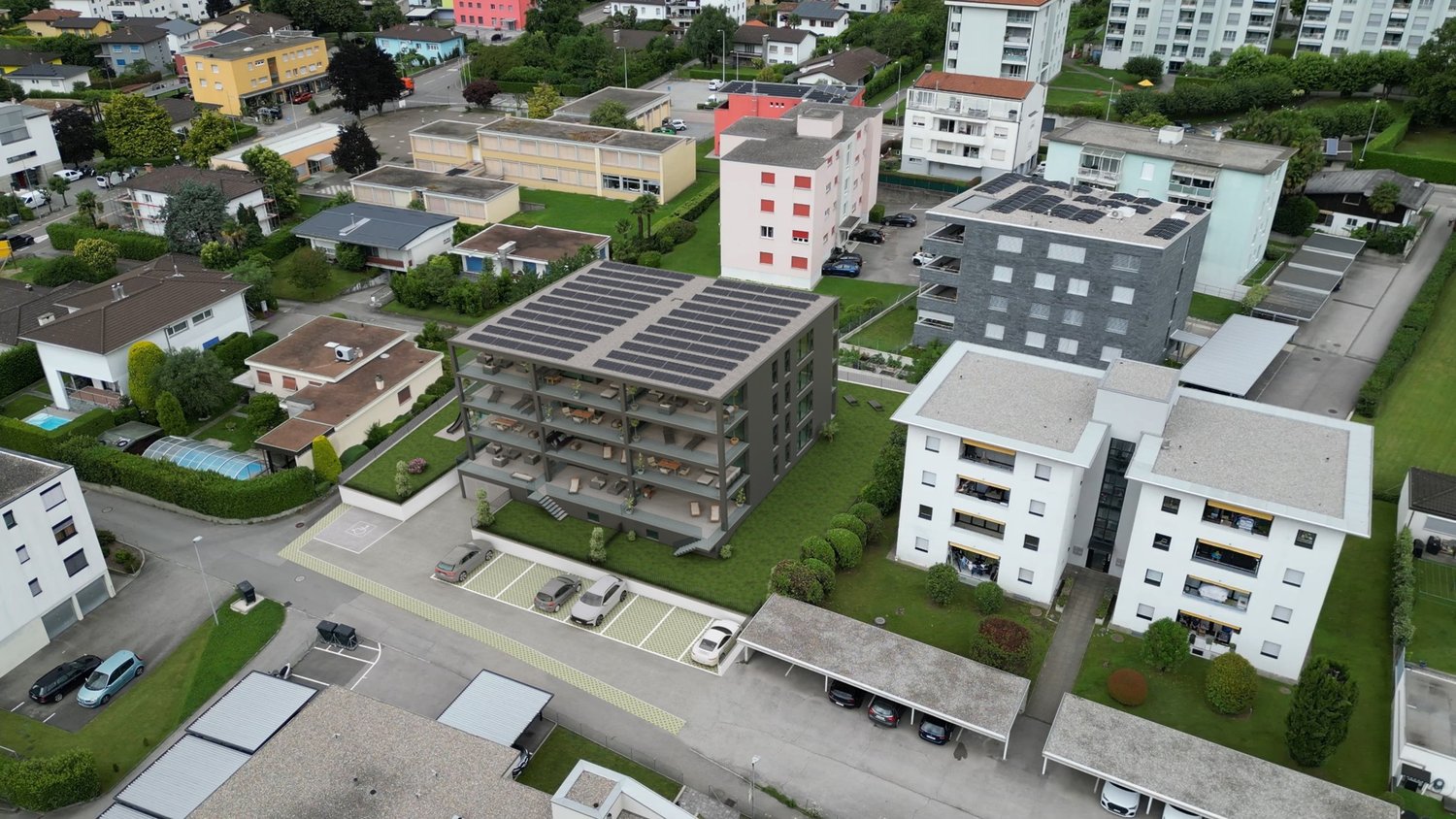 multi-storey apartment buildings, solar panels, swimming pool, several cars parked in underground parking